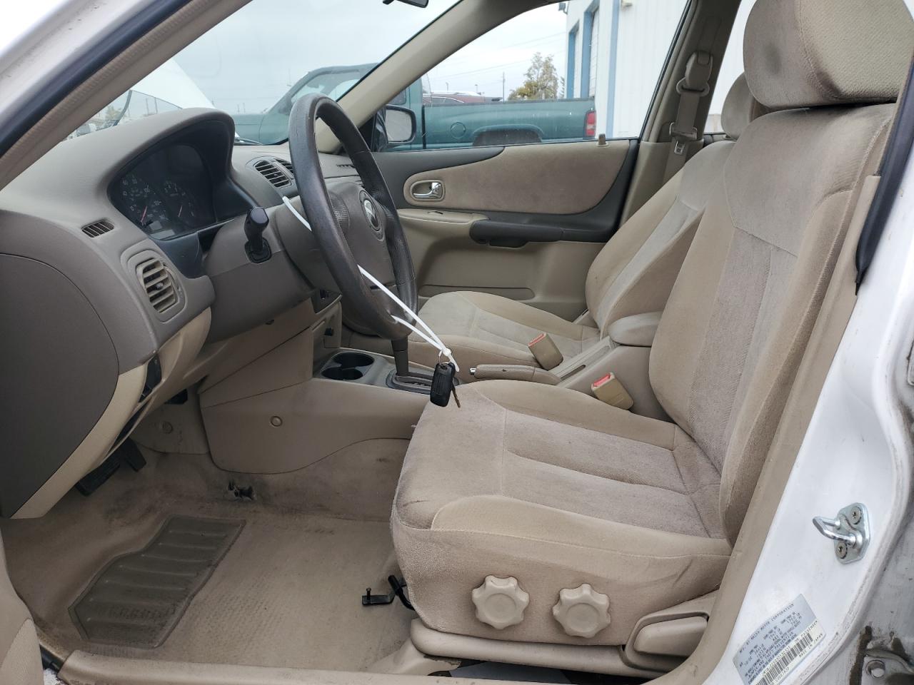 2003 Mazda Protege Dx VIN: JM1BJ225030132335 Lot: 91643565