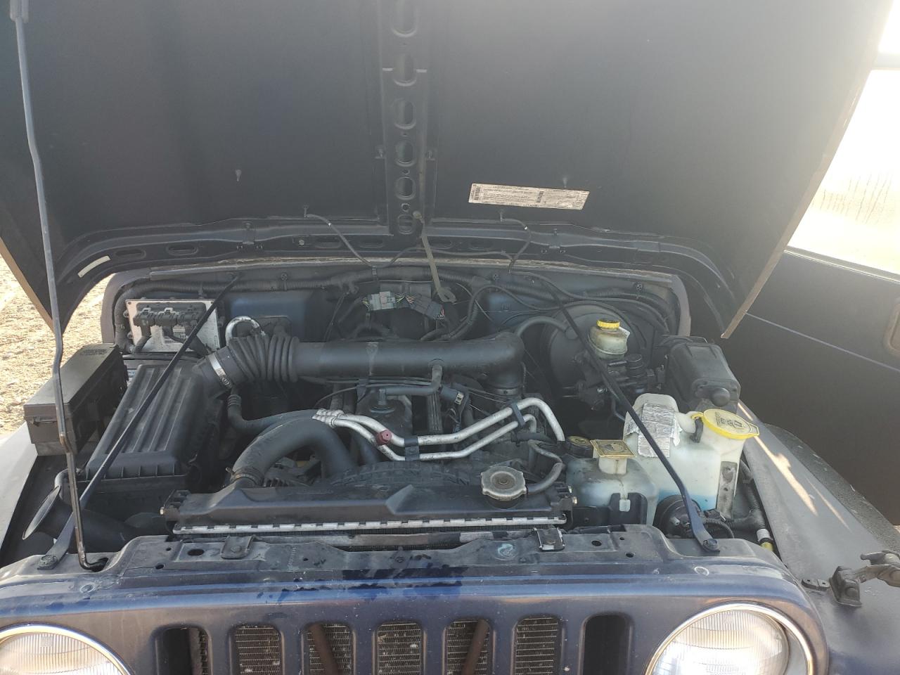 2000 Jeep Wrangler / Tj Sport VIN: 1J4FA49SXYP746312 Lot: 92477325