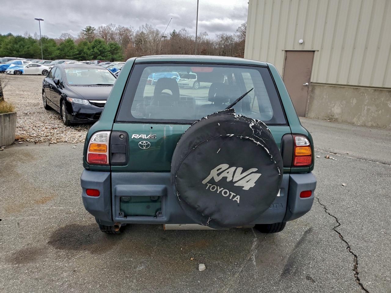 1998 Toyota Rav4 Le VIN: JTMBFREV2EJ009011 Lot: 93507485