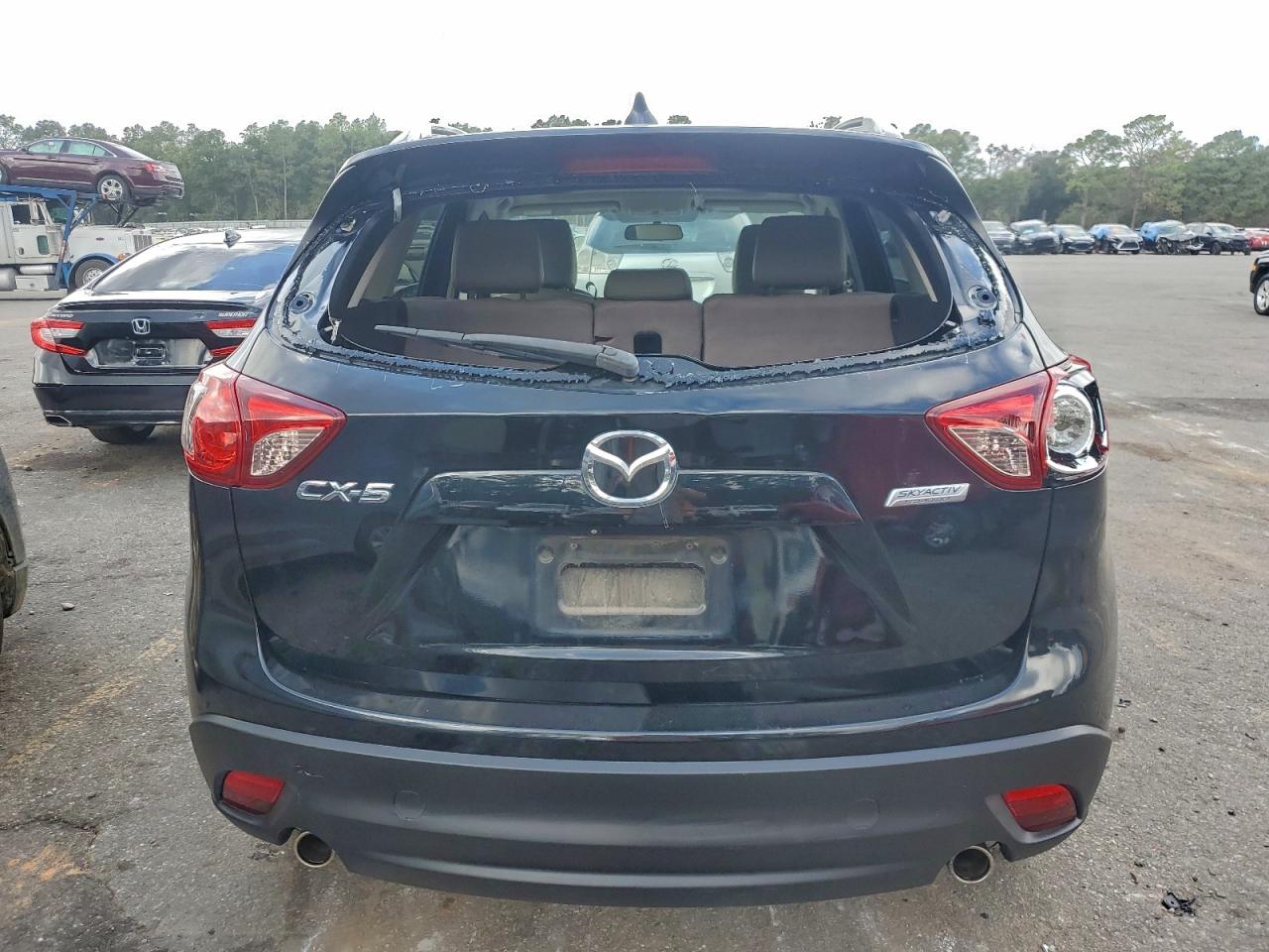 2014 Mazda Cx-5 Touring VIN: JM3KE2CY1E0340747 Lot: 94109385