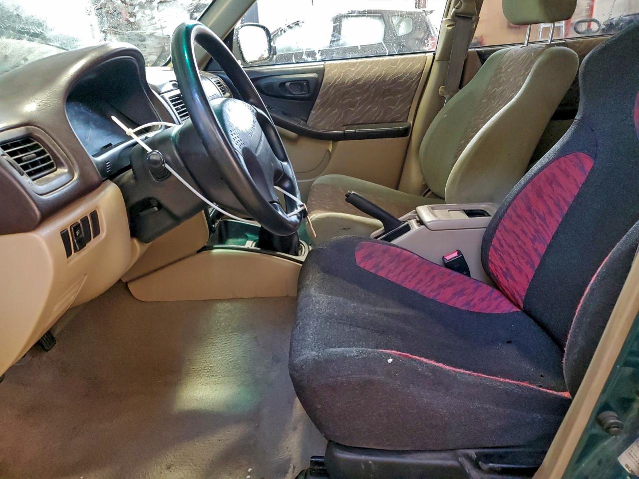 1998 Subaru Forester L VIN: JF1SF6350WG750330 Lot: 93550415