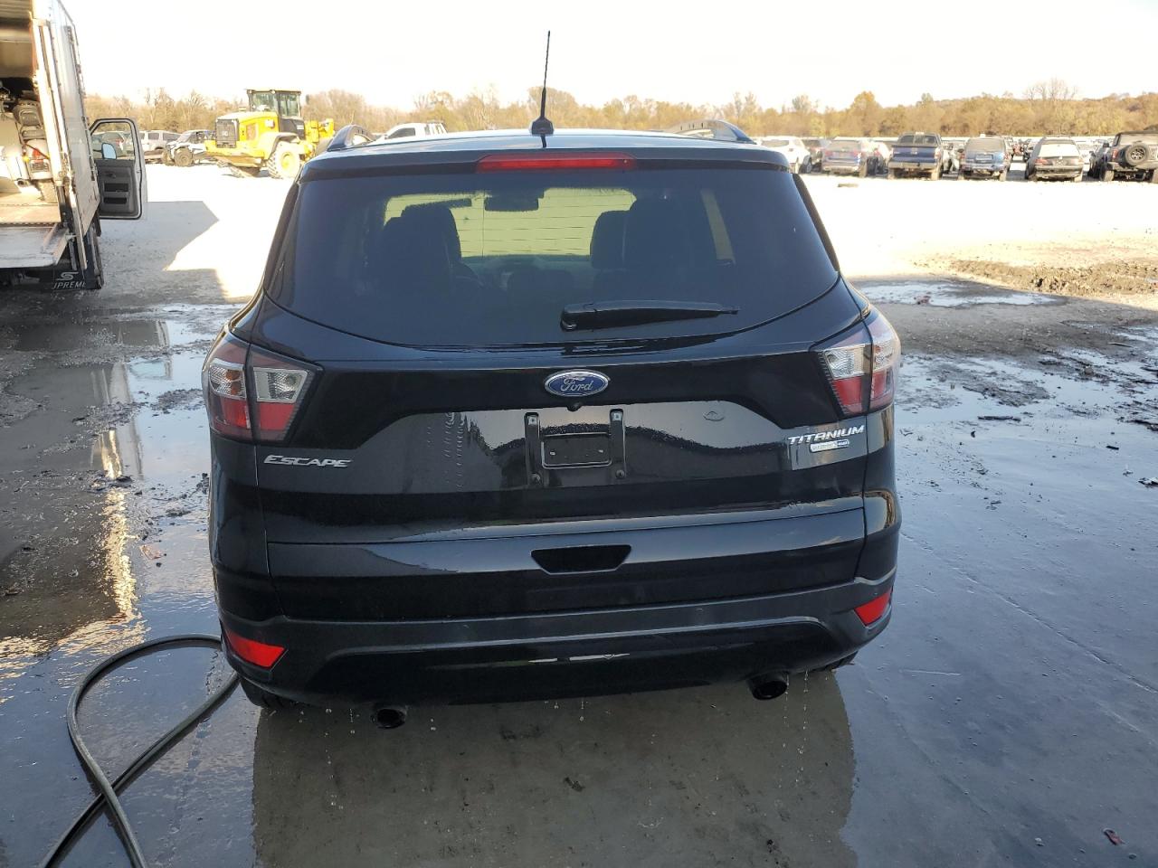 2017 Ford Escape Titanium VIN: 1FMCU9J9XHUC93800 Lot: 91766085