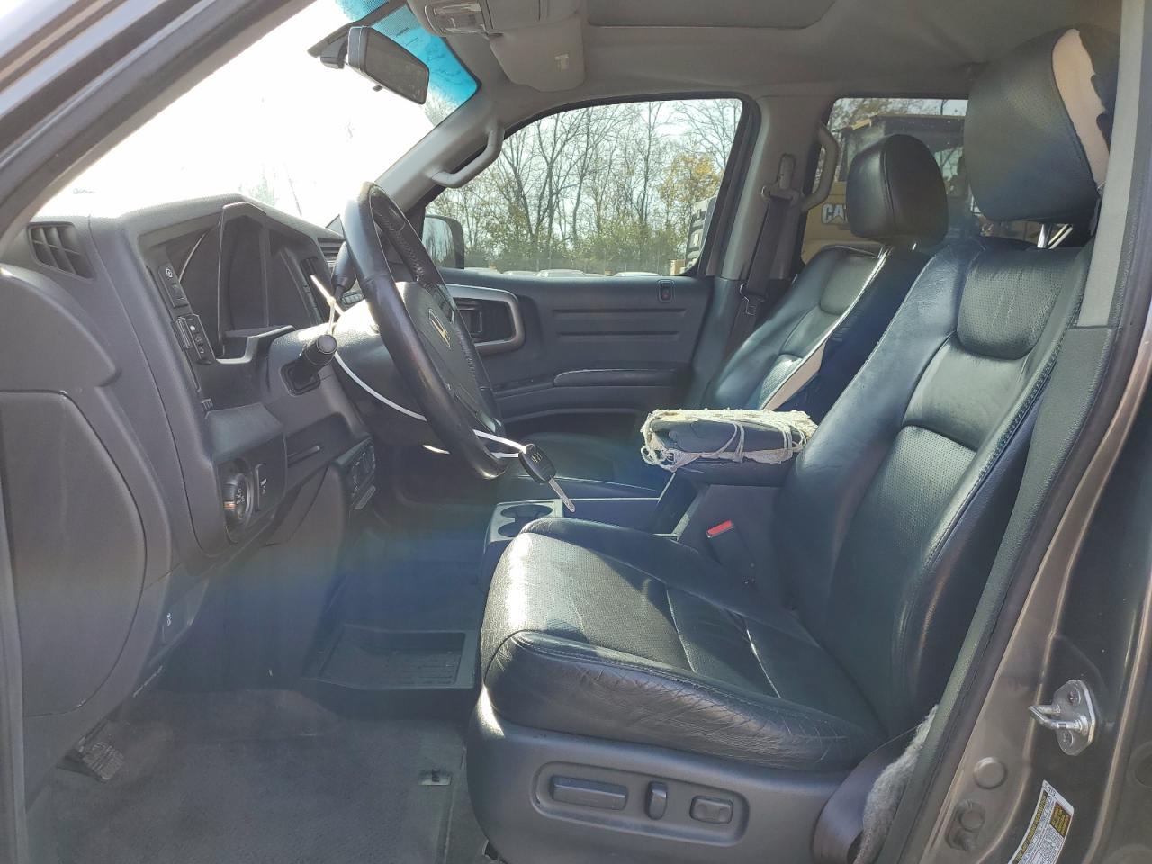 2012 Honda Ridgeline Rtl VIN: 5FPYK1F50CB003127 Lot: 91490905