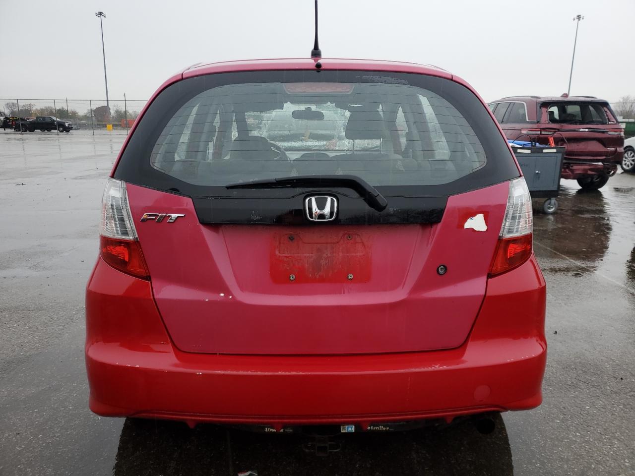 2010 Honda Fit VIN: JHMGE8H25AC001065 Lot: 93149925