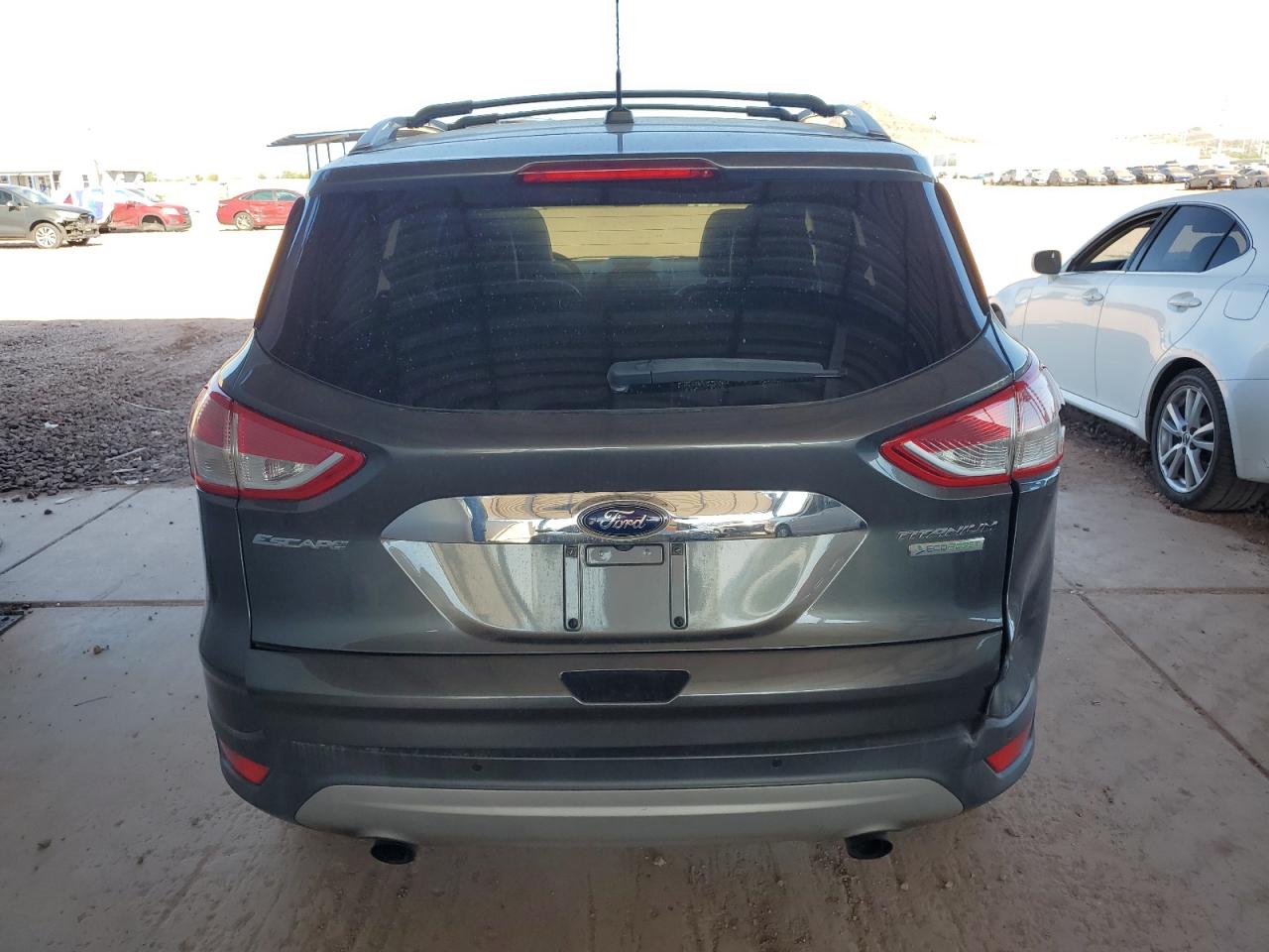 2016 Ford Escape Titanium VIN: 1FMCU0J96GUB99892 Lot: 91675935