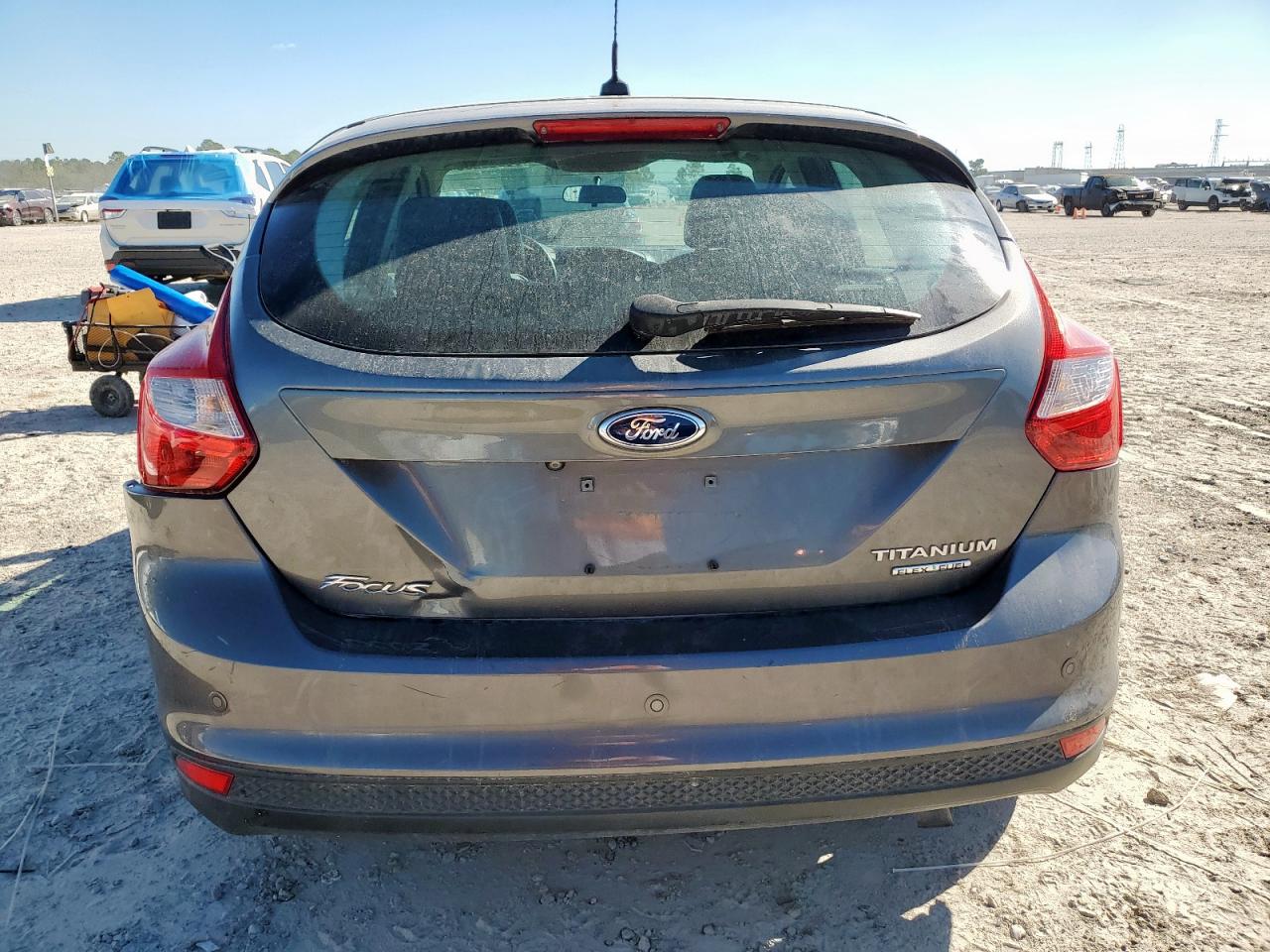 2014 Ford Focus Titanium VIN: 1FADP3N20EL156043 Lot: 90835295