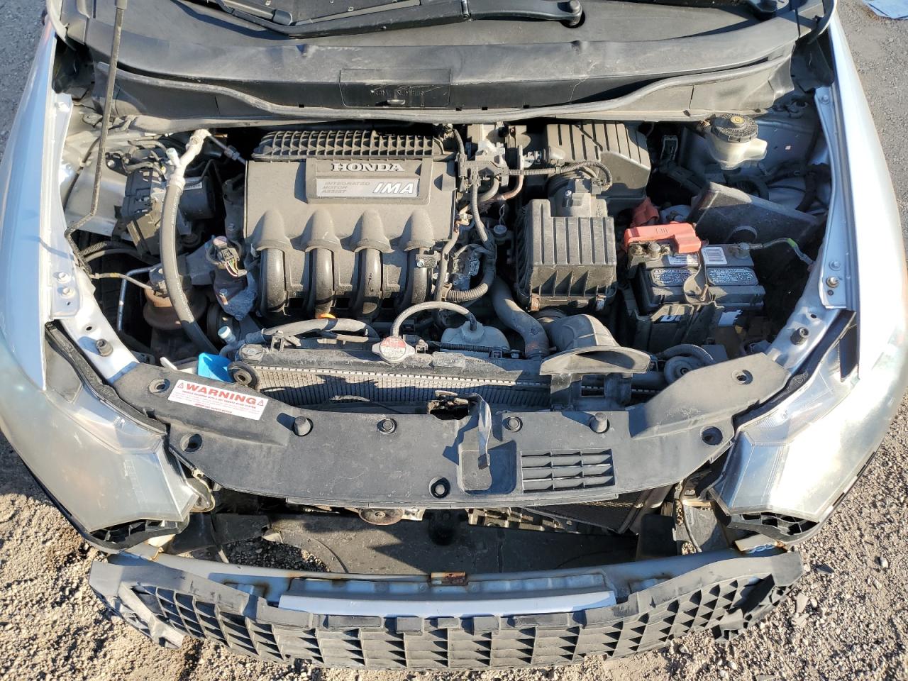 2010 Honda Insight Ex VIN: JHMZE2H71AS001927 Lot: 91524075