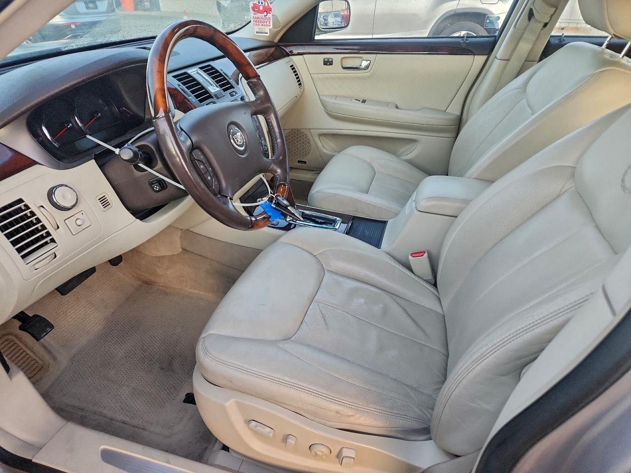 2009 Cadillac Dts VIN: 1G6KD57959U127169 Lot: 93915405