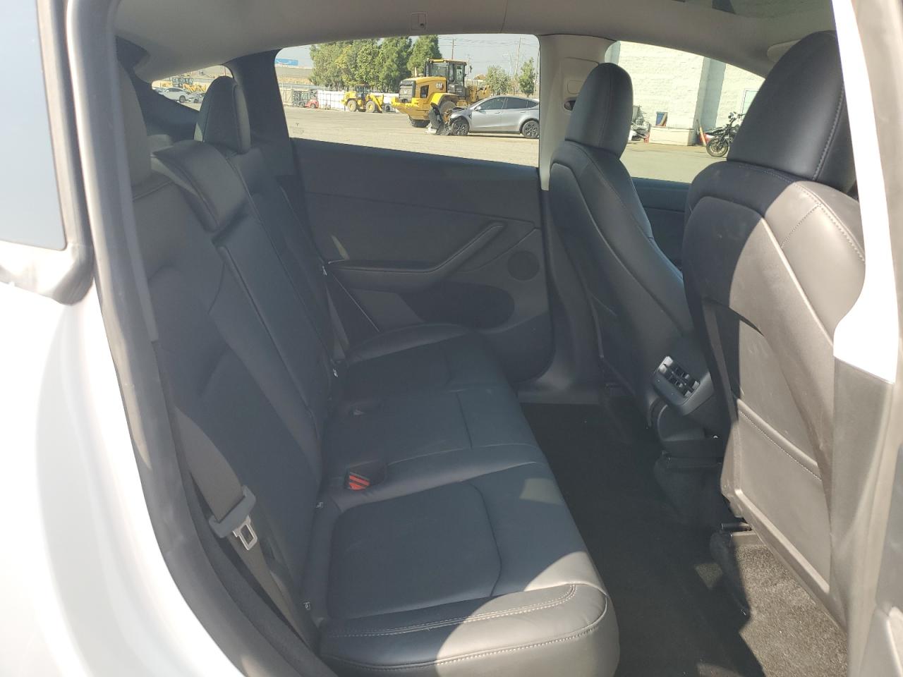 2023 Tesla Model Y VIN: 7SAYGDEE2PA130013 Lot: 91915425