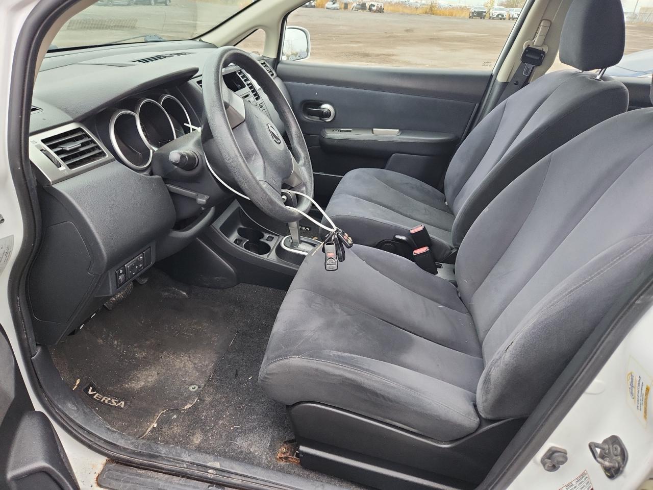 2009 Nissan Versa S VIN: 3N1BC13E79L488282 Lot: 91325065