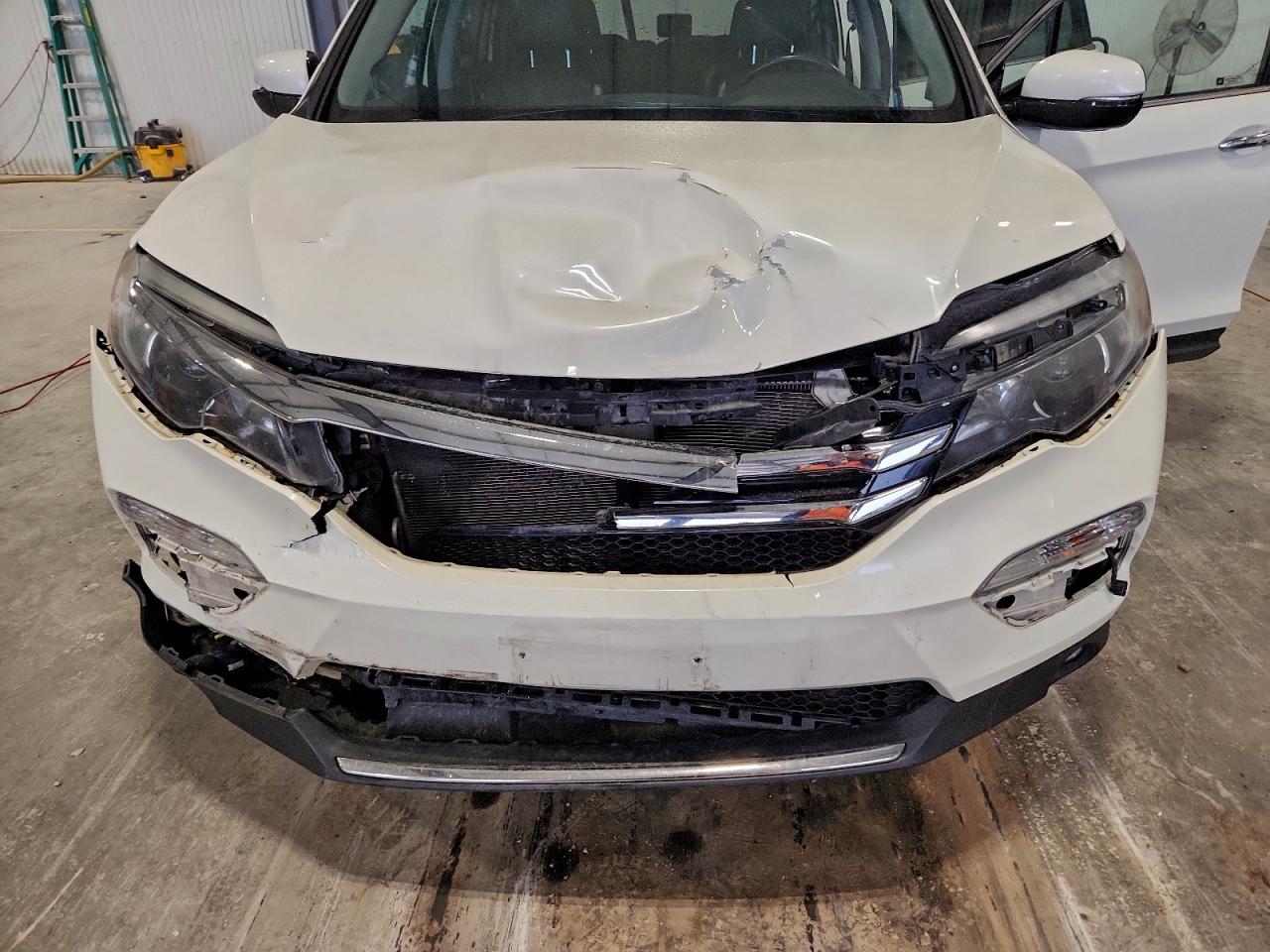 2017 Honda Pilot Elite VIN: 5FNYF6H06HB060371 Lot: 93517525