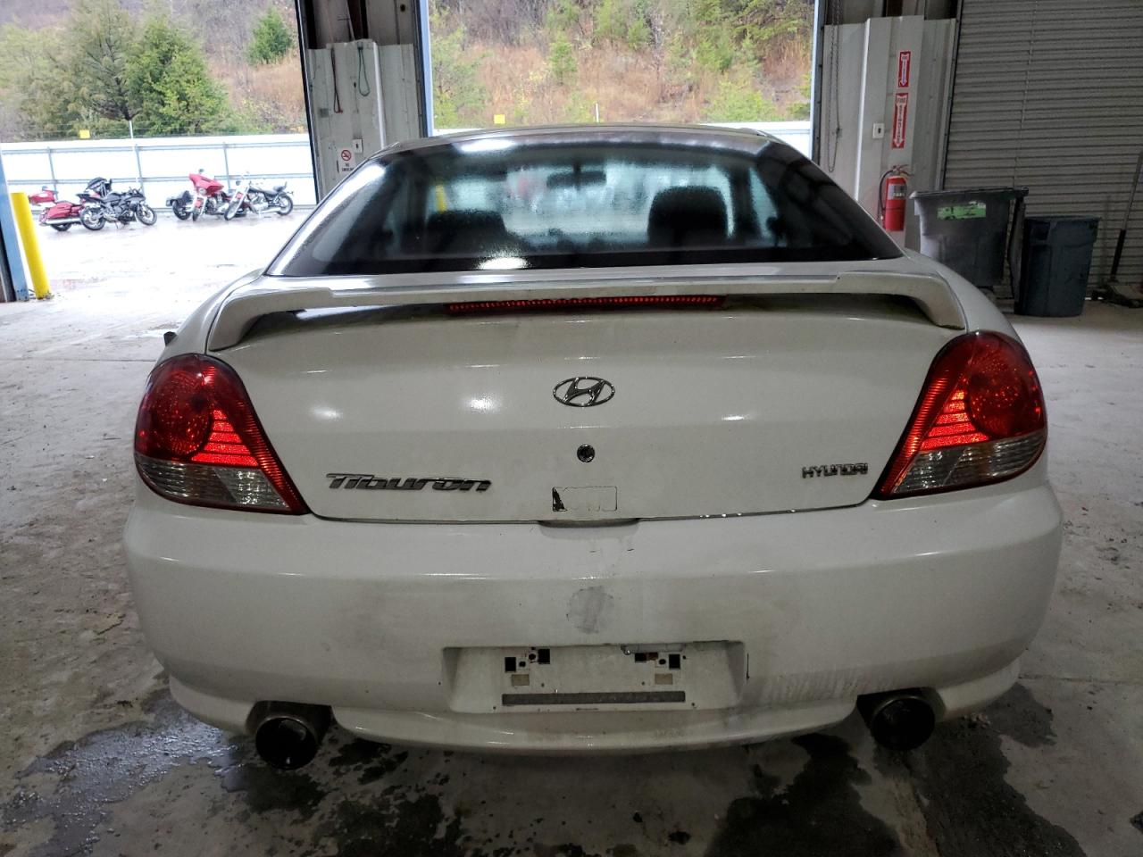 2005 Hyundai Tiburon VIN: KMHHM65D75U180109 Lot: 93043595