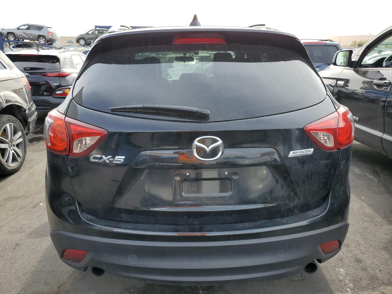 2014 Mazda Cx-5 Touring VIN: JM3KE2CY3E0361065 Lot: 92329885