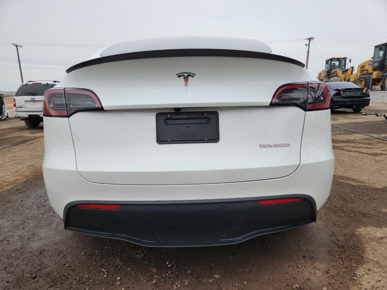 2025 Tesla Model Y VIN: 7SAYGDEF2SF303811 Lot: 93290035
