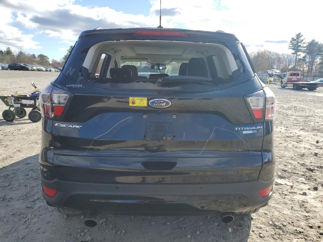 2017 Ford Escape Titanium VIN: 1FMCU9J99HUA74035 Lot: 92291655