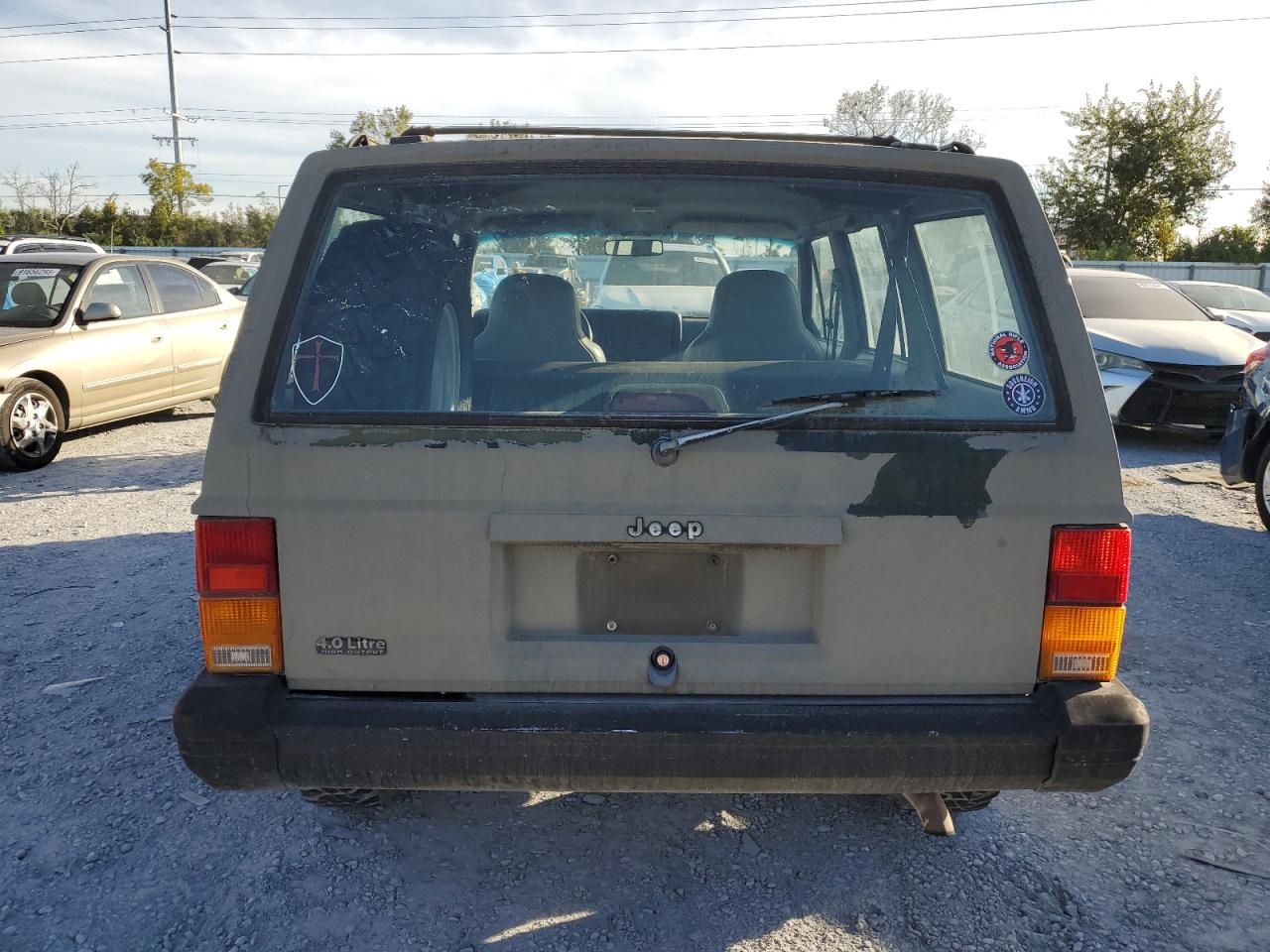 1996 Jeep Cherokee Sport VIN: 1J4FT68S0TL219502 Lot: 92505625