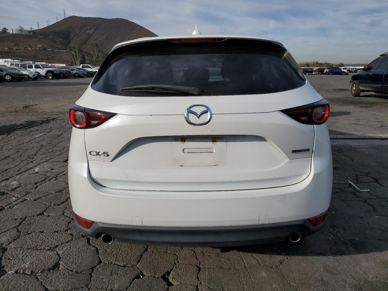 2021 Mazda Cx-5 Touring VIN: JM3KFACM1M0481742 Lot: 92344365