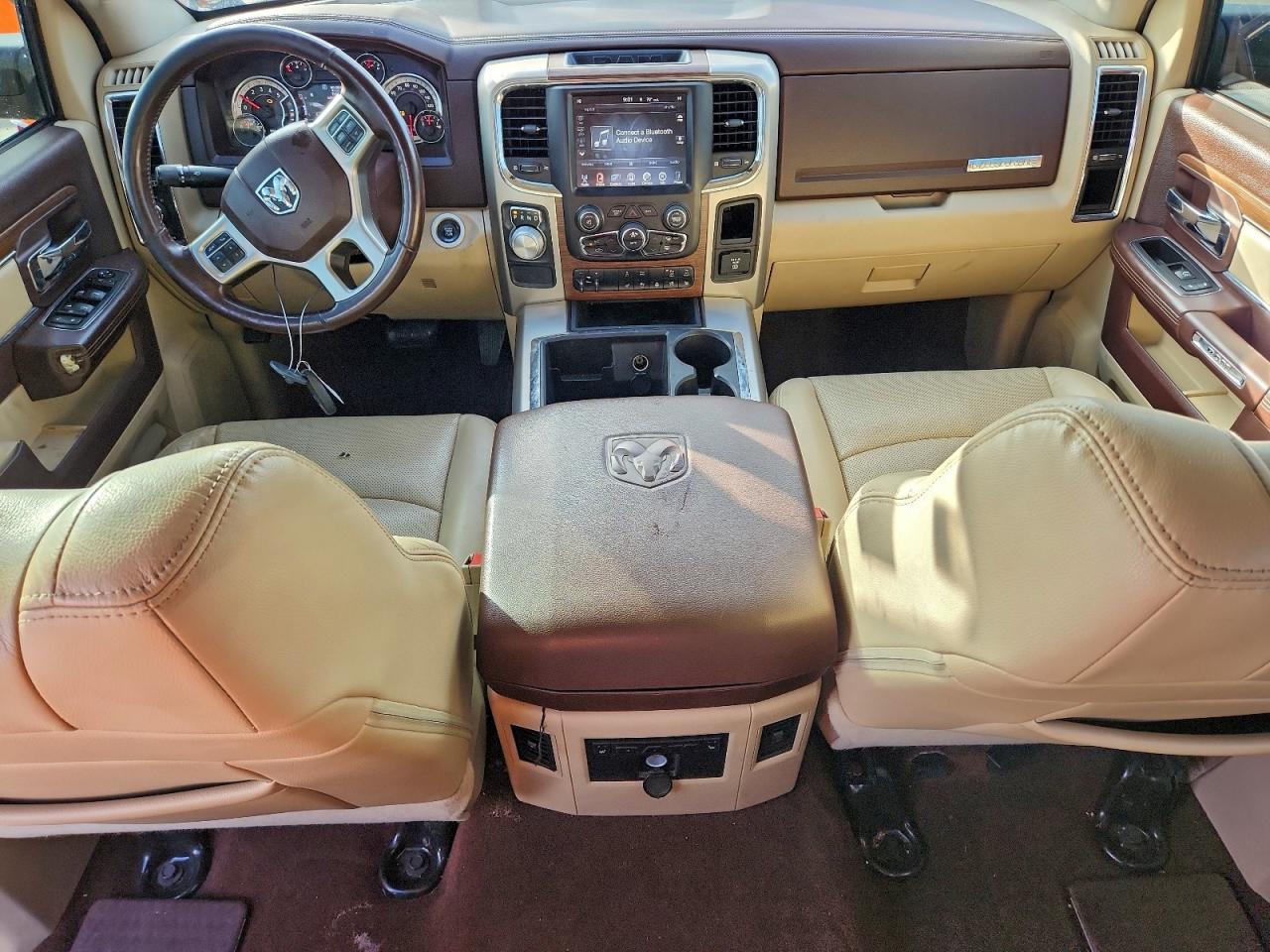 2015 Ram 1500 Laramie VIN: 1C6RR6NM5FS590101 Lot: 93852385