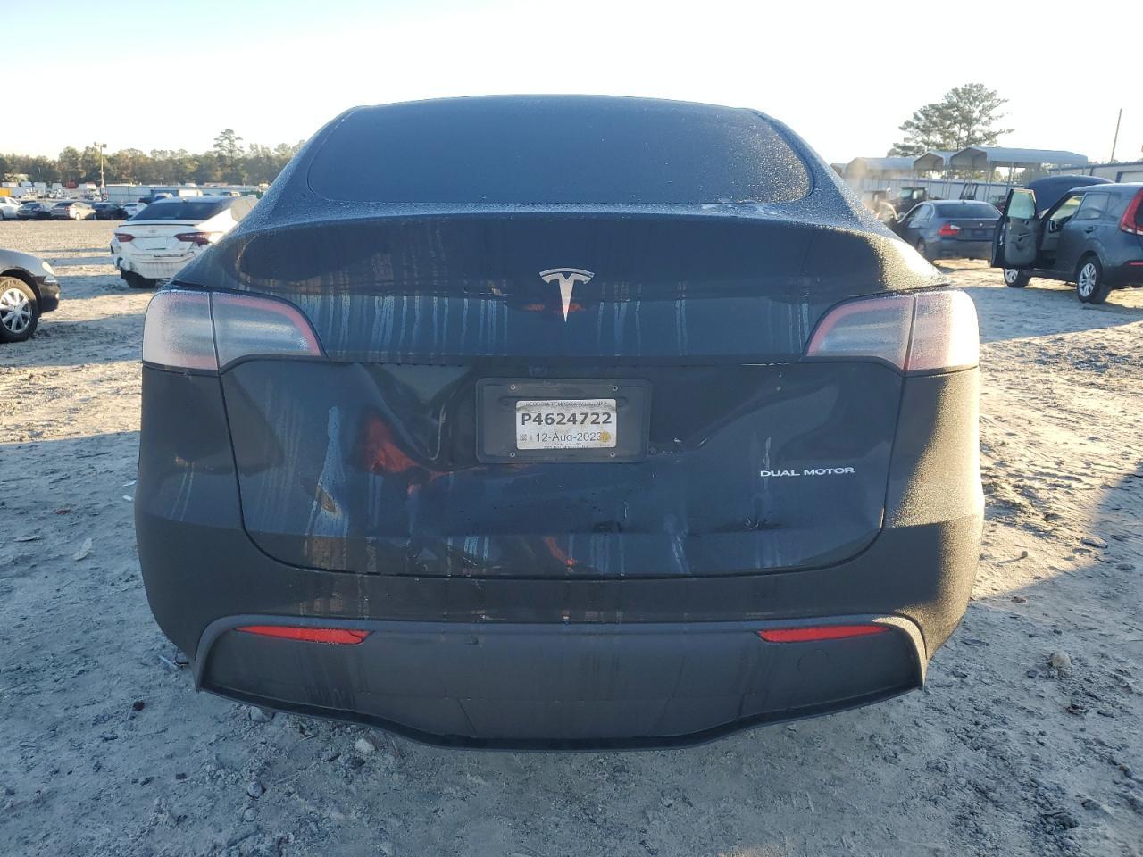 2023 Tesla Model Y VIN: 7SAYGDEE9PA144264 Lot: 90570005