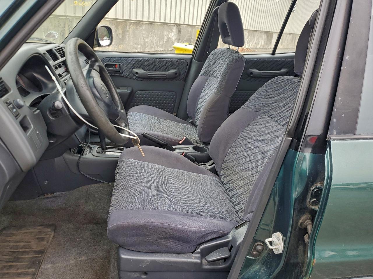 1998 Toyota Rav4 Le VIN: JTMBFREV2EJ009011 Lot: 93507485