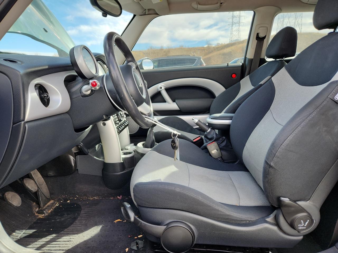 2006 Mini Cooper VIN: WMWRC33536TK71128 Lot: 92328415