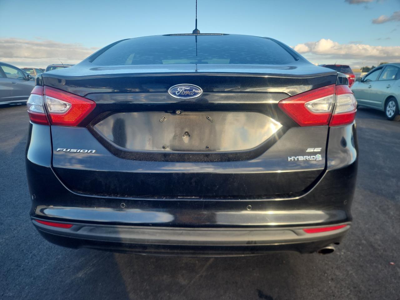 2015 Ford Fusion Se Hybrid VIN: 3FA6P0LU3FR258046 Lot: 91922985