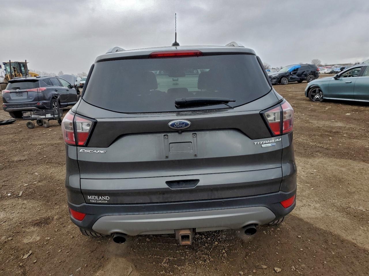 2017 Ford Escape Titanium VIN: 1FMCU9J9XHUB78694 Lot: 94495255
