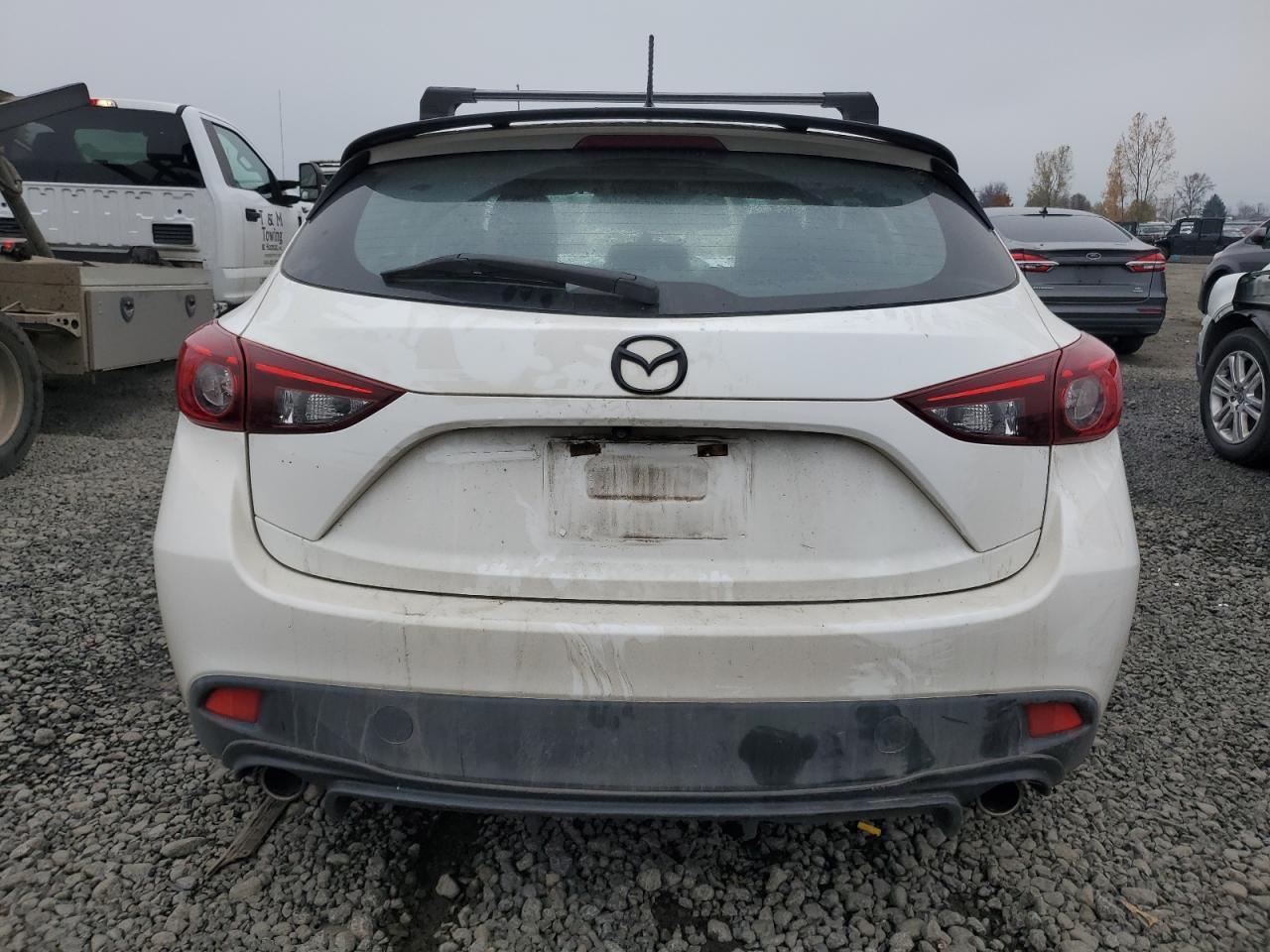 2014 Mazda 3 Touring VIN: JM1BM1L79E1130632 Lot: 92233895