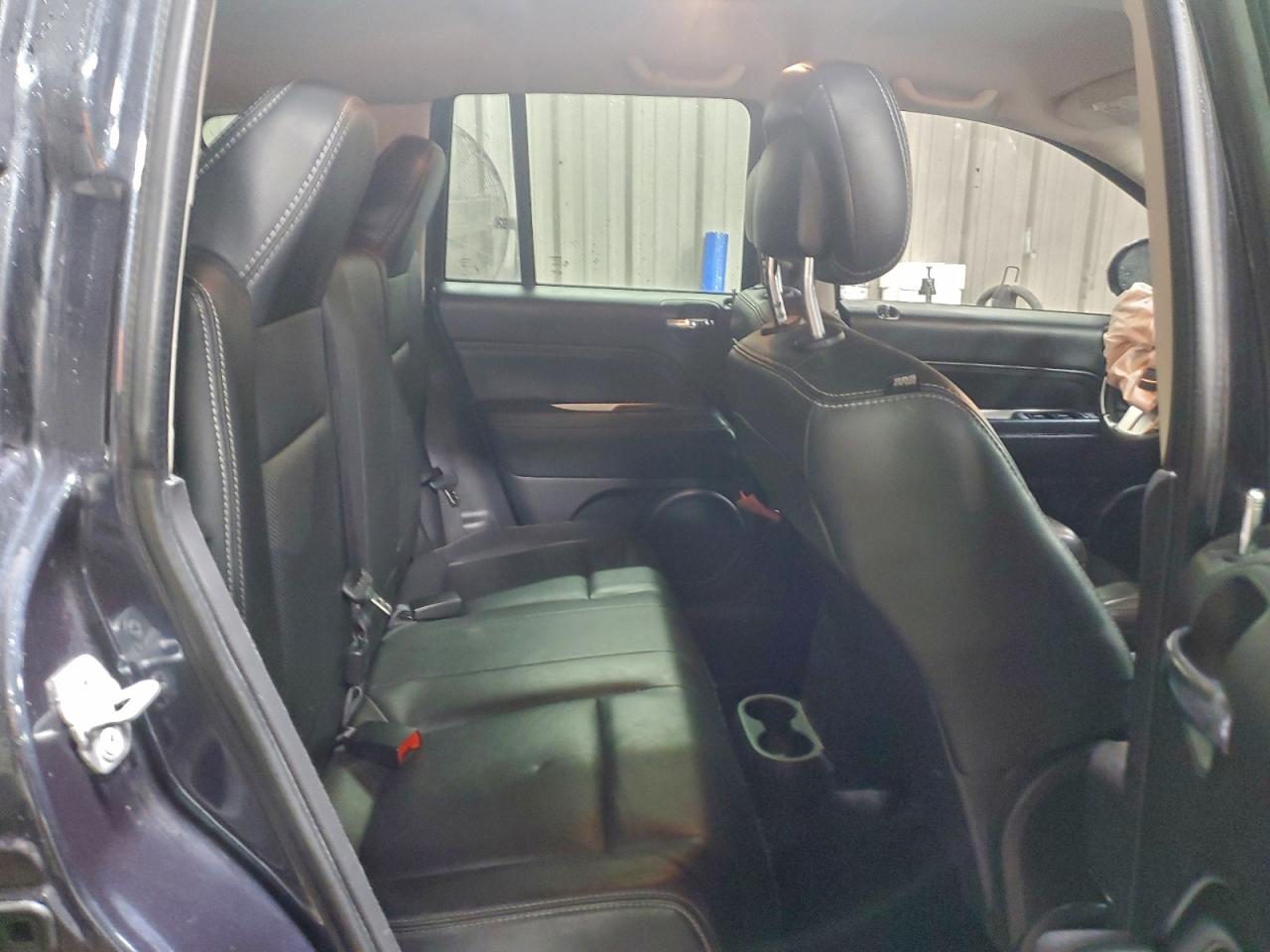 2014 Jeep Compass Limited VIN: 1C4NJCCB1ED652580 Lot: 94750435