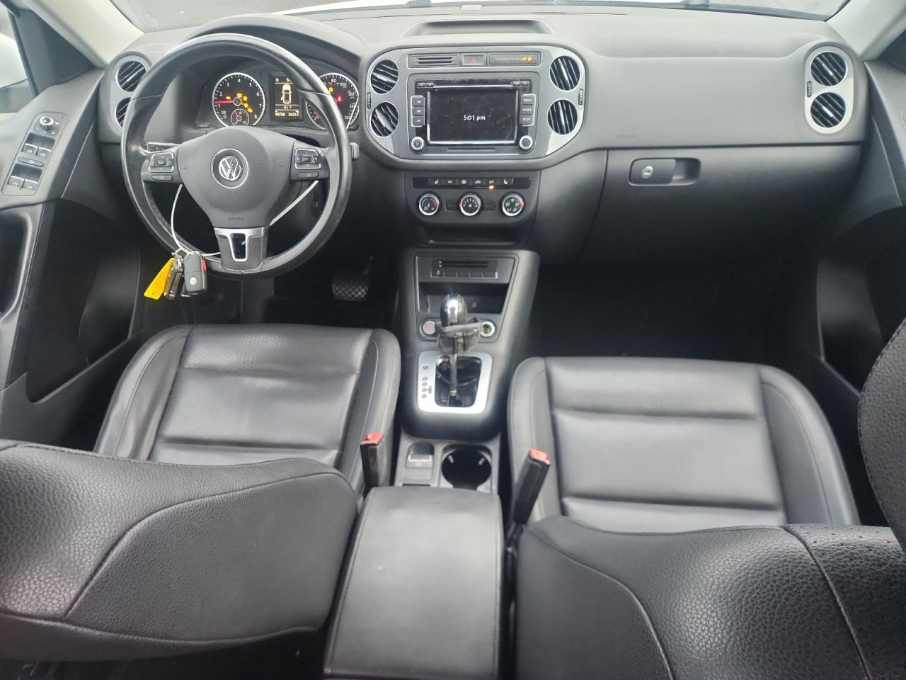 2014 Volkswagen Tiguan S VIN: WVGAV3AX8EW559704 Lot: 91932475