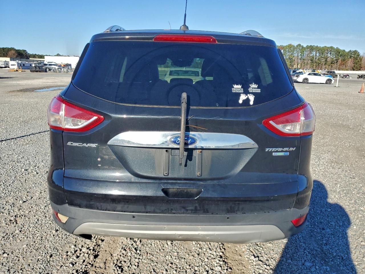 2014 Ford Escape Titanium VIN: 1FMCU9J93EUE05252 Lot: 94070425