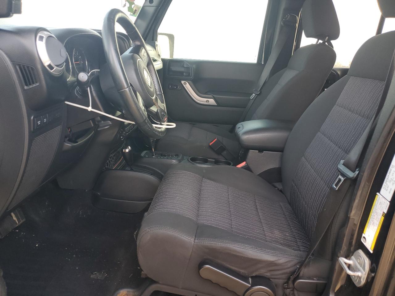 2011 Jeep Wrangler Unlimited Rubicon VIN: 1J4BA6H16BL565225 Lot: 91453585