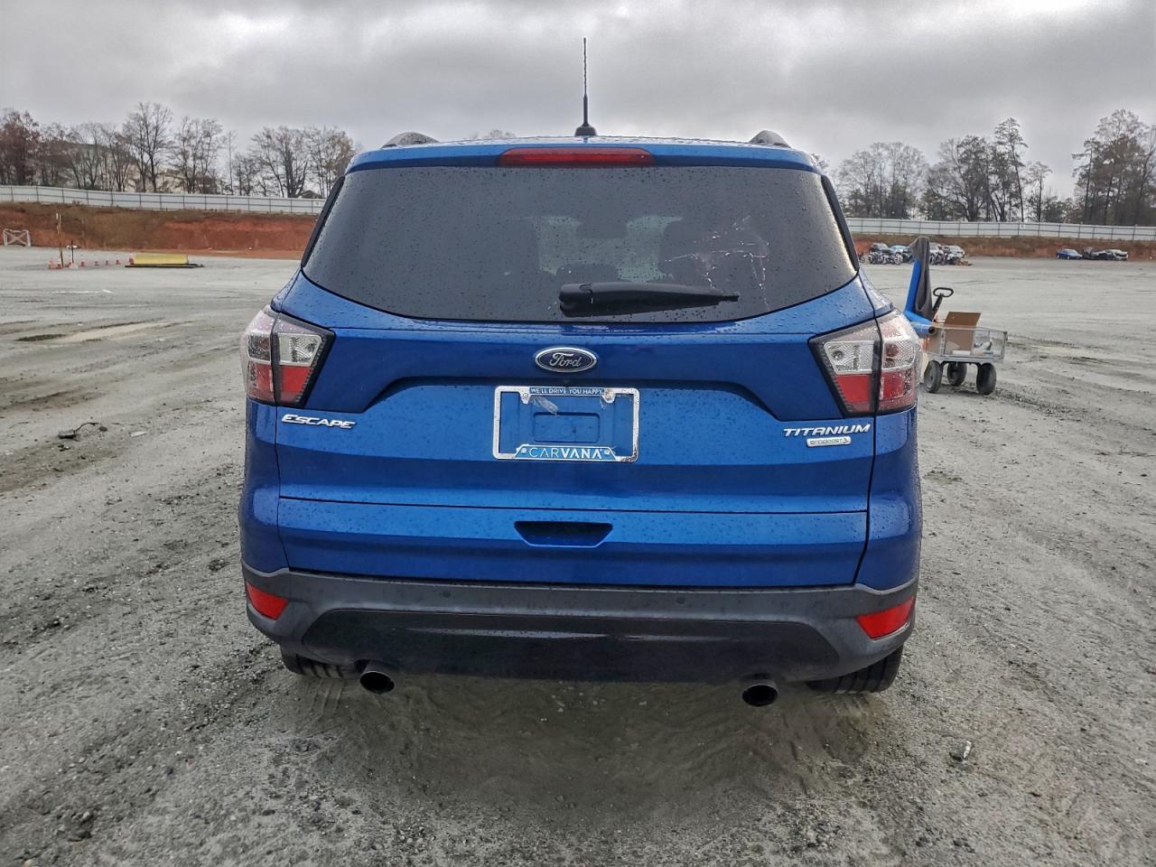 2017 Ford Escape Titanium VIN: 1FMCU0J94HUE97083 Lot: 94064845