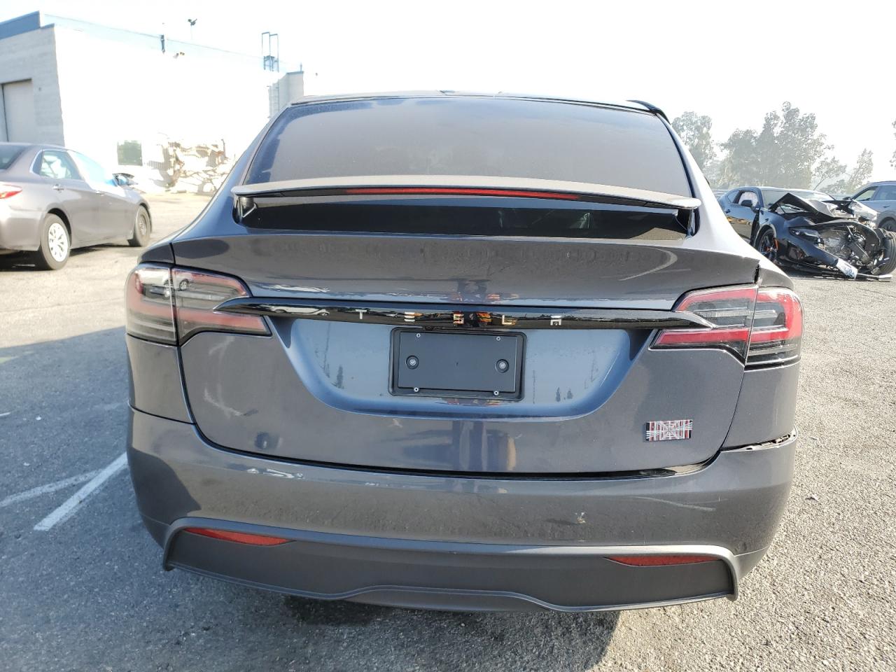 2023 Tesla Model X VIN: 7SAXCBE62PF409176 Lot: 90621345