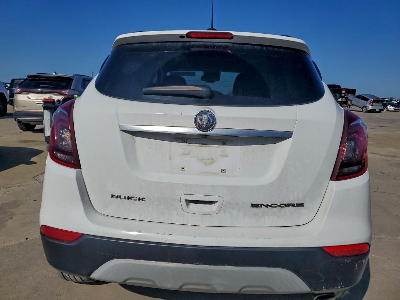 2018 Buick Encore Essence VIN: KL4CJCSB1JB528852 Lot: 93945295