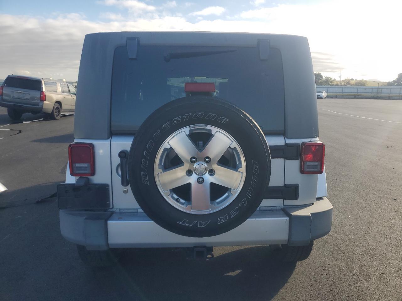 2008 Jeep Wrangler Unlimited Sahara VIN: 1J8GB59168L619965 Lot: 93532735