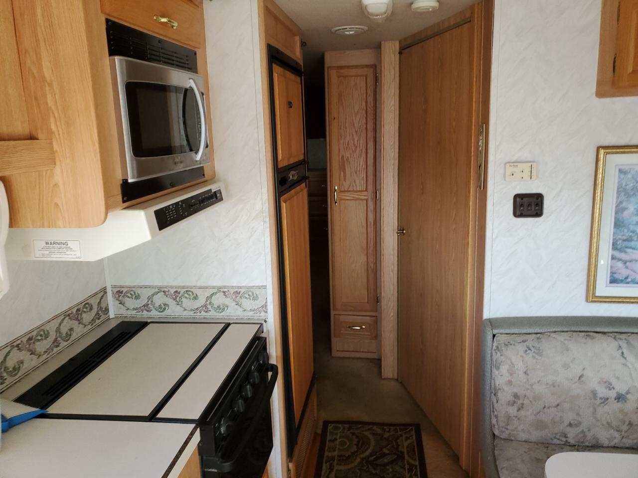 1999 Ford Super Duty F-550 Mot VIN: 3FCMF53S1XJA31163 Lot: 89496345