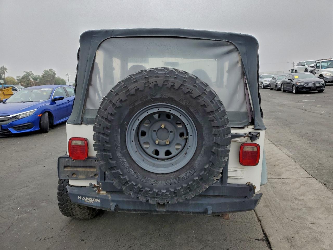 1997 Jeep Wrangler / Tj Sport VIN: 1J4FY19S3VP521333 Lot: 94215365