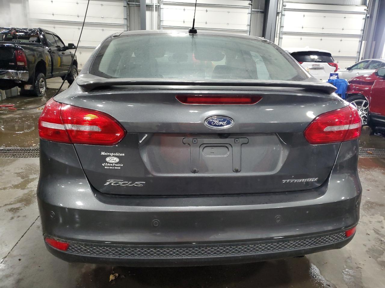 2017 Ford Focus Titanium VIN: 1FADP3J20HL238784 Lot: 92239965