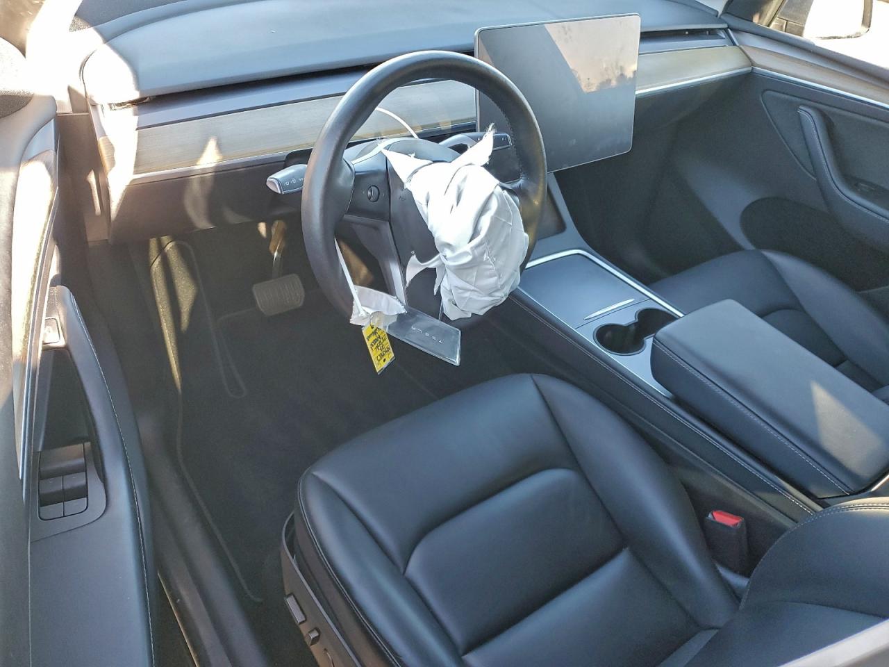 2023 Tesla Model Y VIN: 7SAYGDEE7PA038718 Lot: 93843405