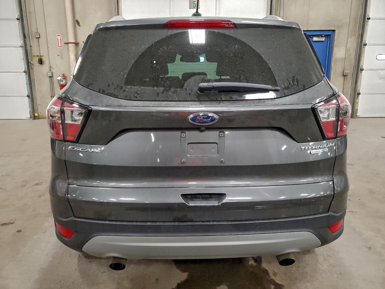 2017 Ford Escape Titanium VIN: 1FMCU9JD7HUB71853 Lot: 94041355
