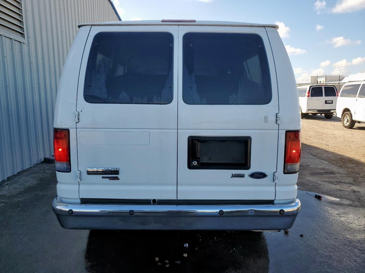 2009 Ford Econoline E350 Super Duty Wagon VIN: 1FBNE31L69DA22497 Lot: 92700865