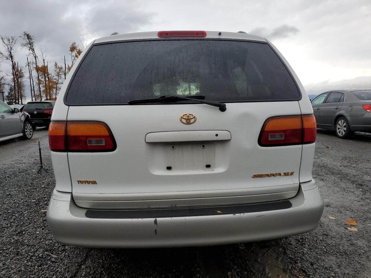 2000 Toyota Sienna Le VIN: 4T3ZF13C4YU242234 Lot: 91557675