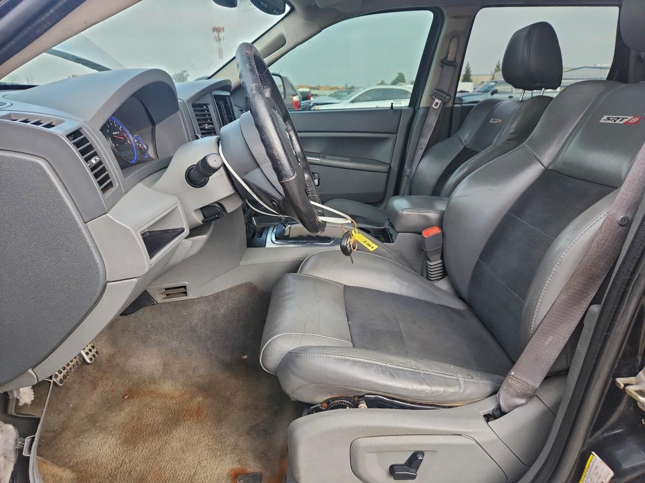 2007 Jeep Grand Cherokee Srt-8 VIN: 1J8HR783X7C557497 Lot: 94736365