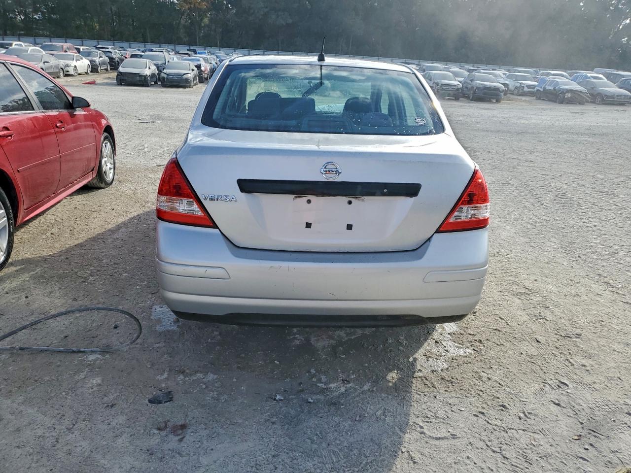 2009 Nissan Versa S VIN: 3N1CC11E69L499717 Lot: 94538435