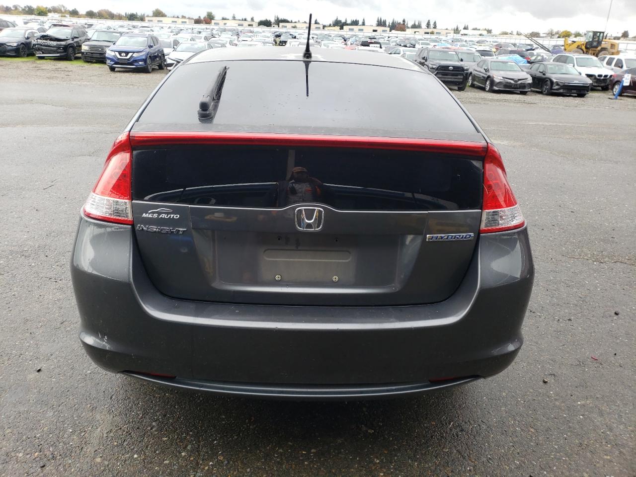 2010 Honda Insight Ex VIN: JHMZE2H70AS017455 Lot: 93970205