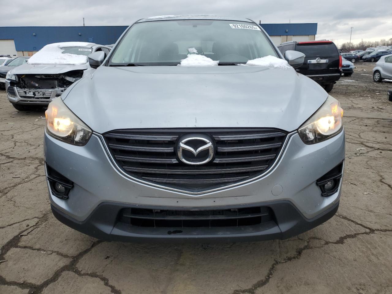 2016 Mazda Cx-5 Touring VIN: JM3KE4CY1G0618805 Lot: 92100265