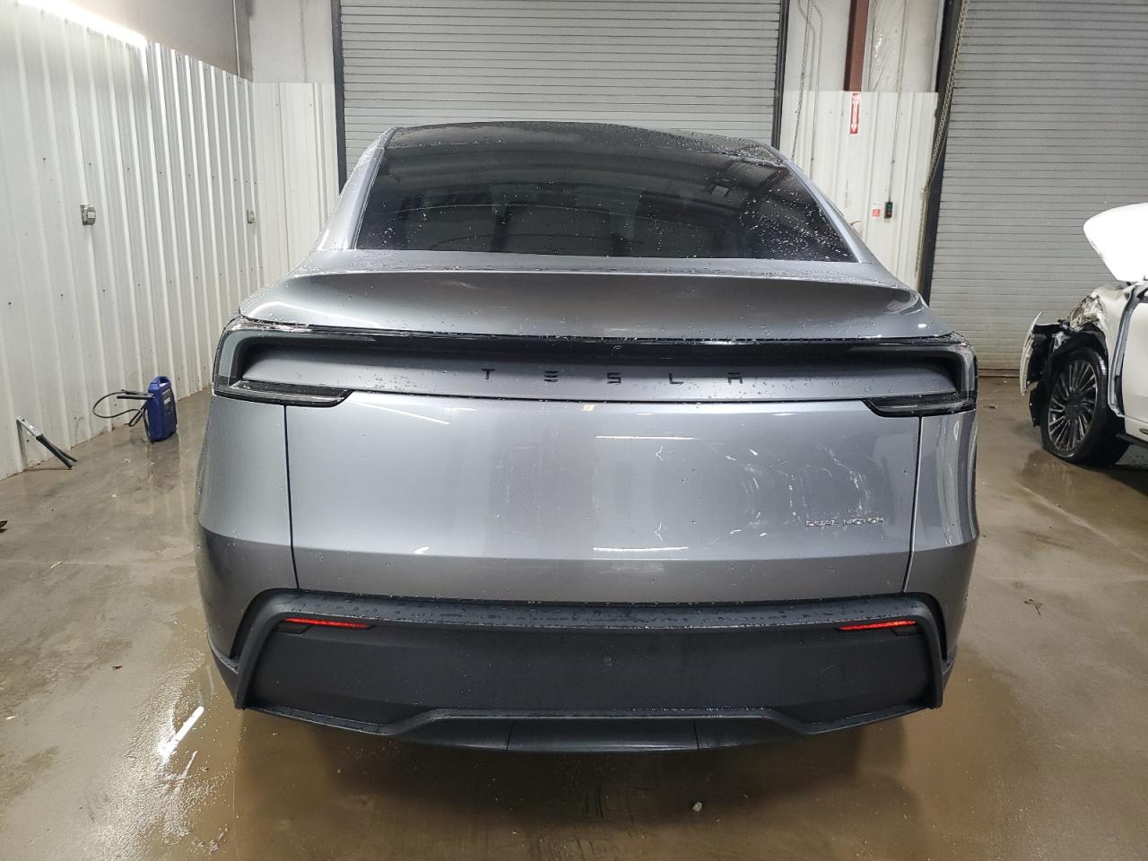2026 Tesla Model Y VIN: 7SAYGDEE1TA450675 Lot: 93067175