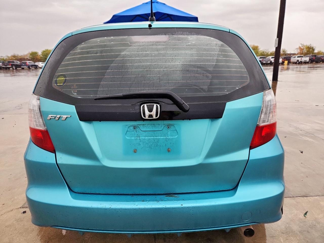 2012 Honda Fit VIN: JHMGE8H39CC010024 Lot: 93739085