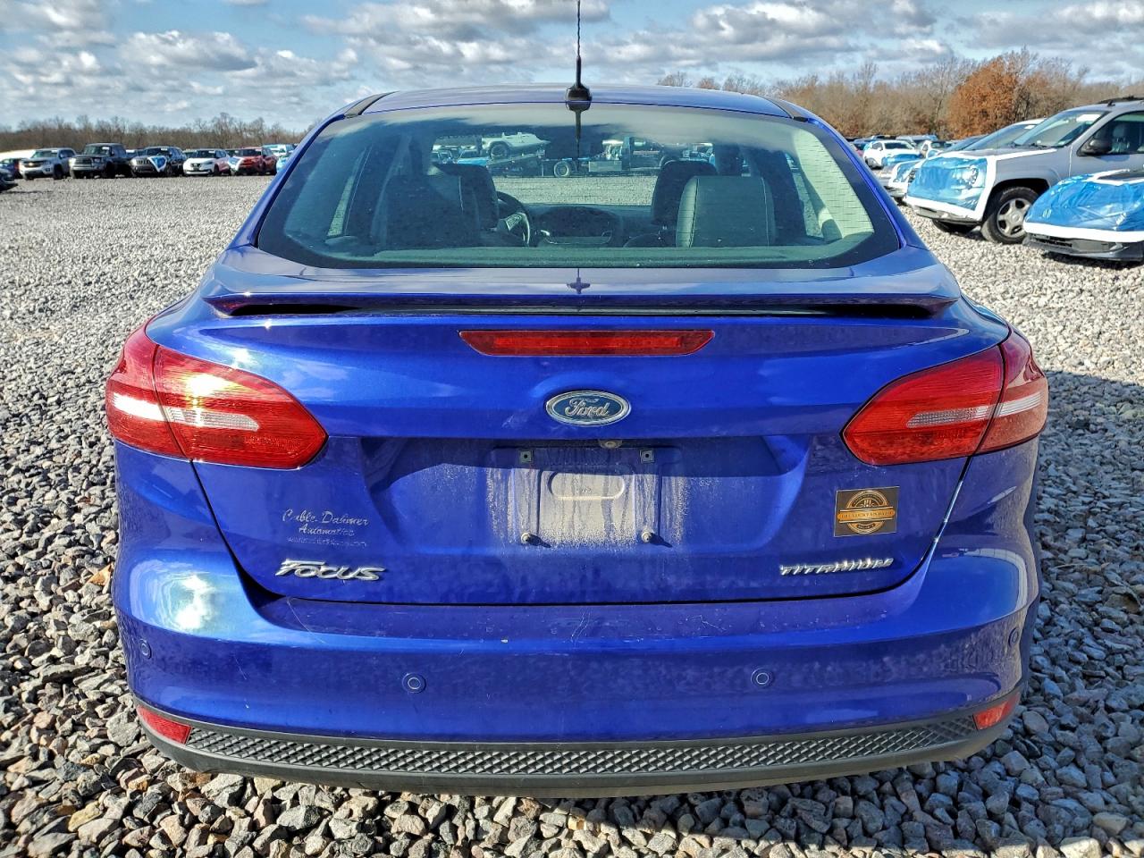 2015 Ford Focus Titanium VIN: 1FADP3J25FL256940 Lot: 94465575